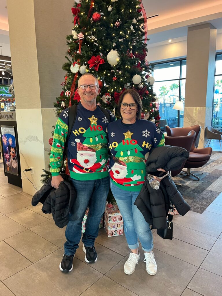 Photo wearing christmas sweaters before heading to Disneyland to celebration the festive season at Disneyland