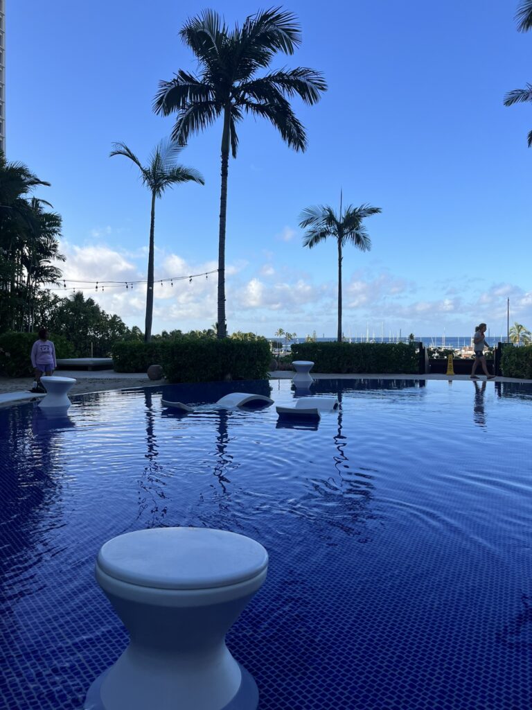 Picture of the pool area at The Modern Honolulu Hotel at Waikiki Beach 48 Hour Itinerary in Hawaii.