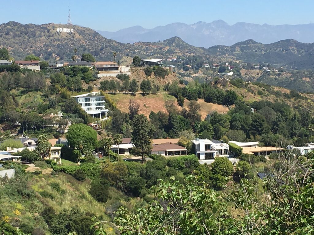 View of the Hollywood sign from the top of Runyon Canyon which is a short walk from the Magic Castle Hotel and Hollywood walk of fame.